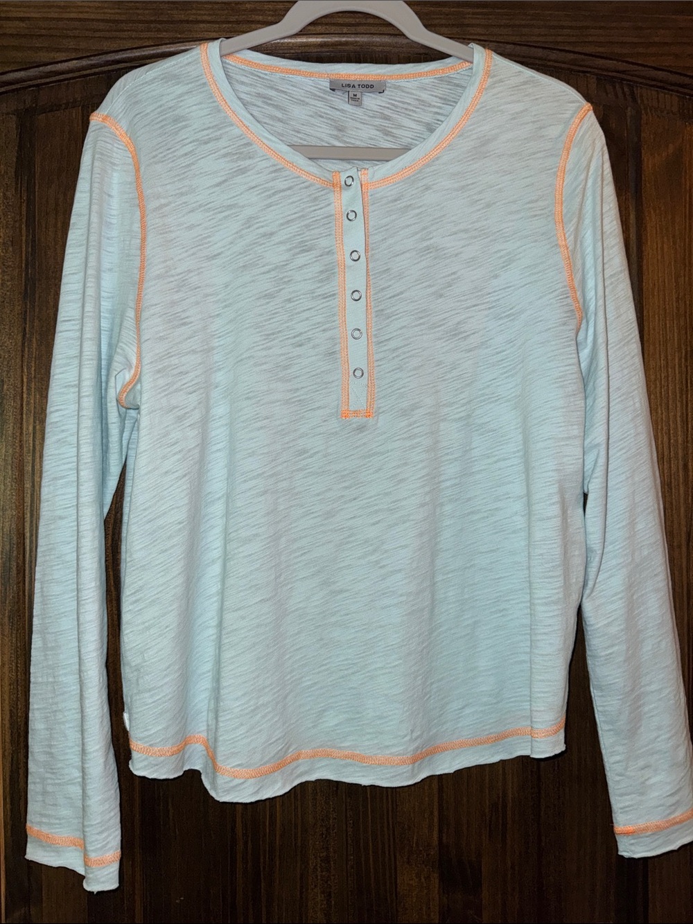 Lisa Todd Light Blue Long Sleeve Henley with Orange Stitching